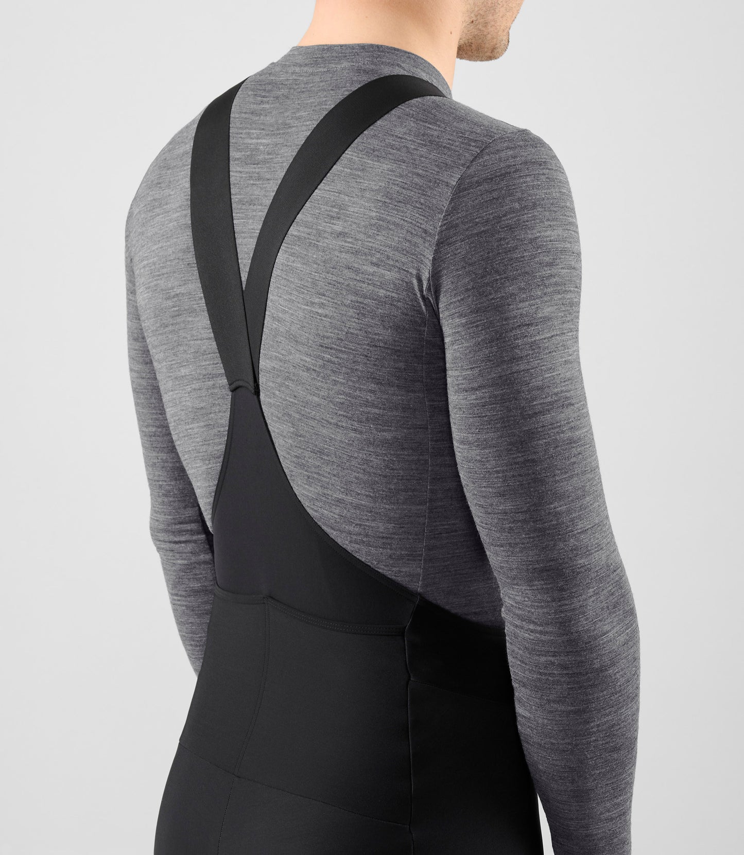 25WMBEL02PE_6_men cycling merino base layer grey element back pedaled