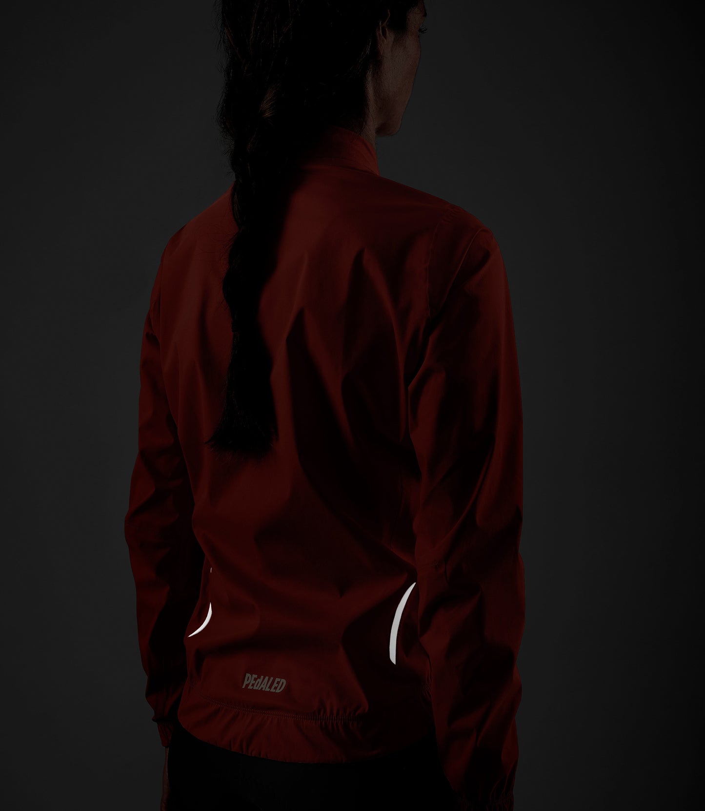 W5WWJEL12PE_9_women cycling waterproof jacket orange element side back reflective pedaled