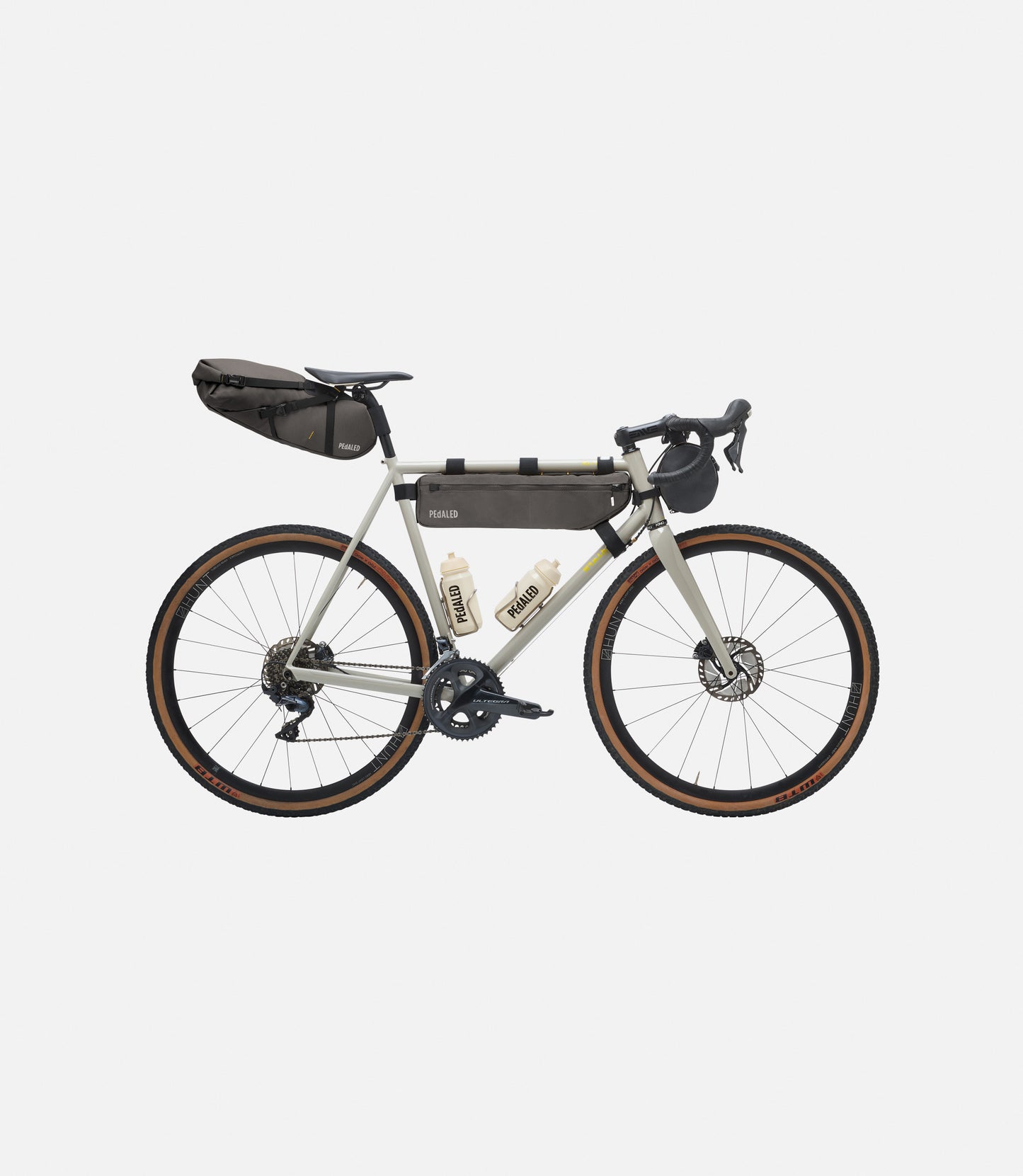 234SBOD23PE_2_bikepacking bag complete kit raven front pedaled 2