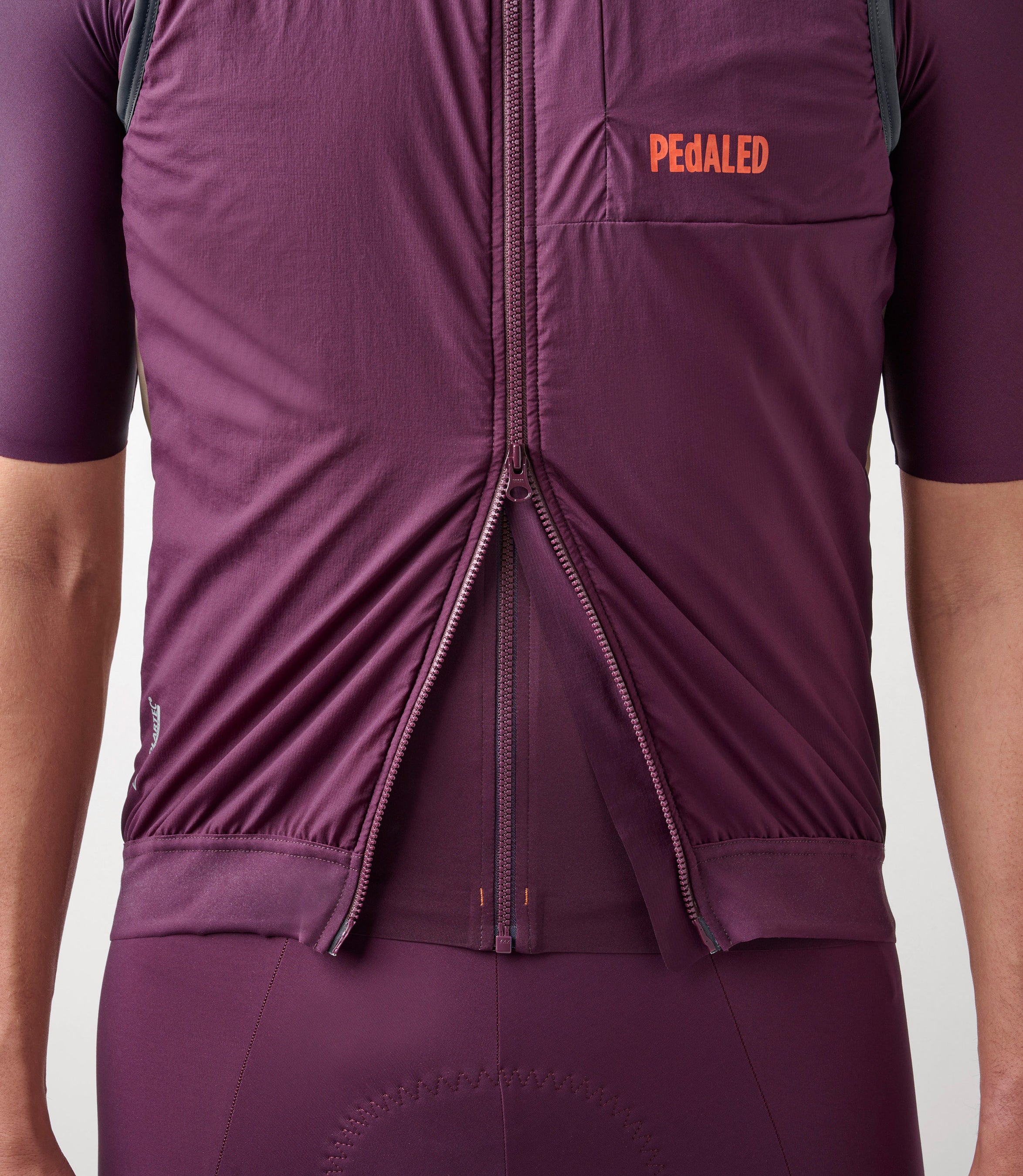 23SAVOD10PE_8_men cycling alpha vest purple odyssey double zip pedaled