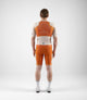 23SBBTC12PE_6_men cycling bib shorts transcontinental orange total body back pedaled