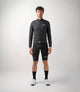 23SJKES00PE_3_men cycling windproof jacket black essential total body front pedaled