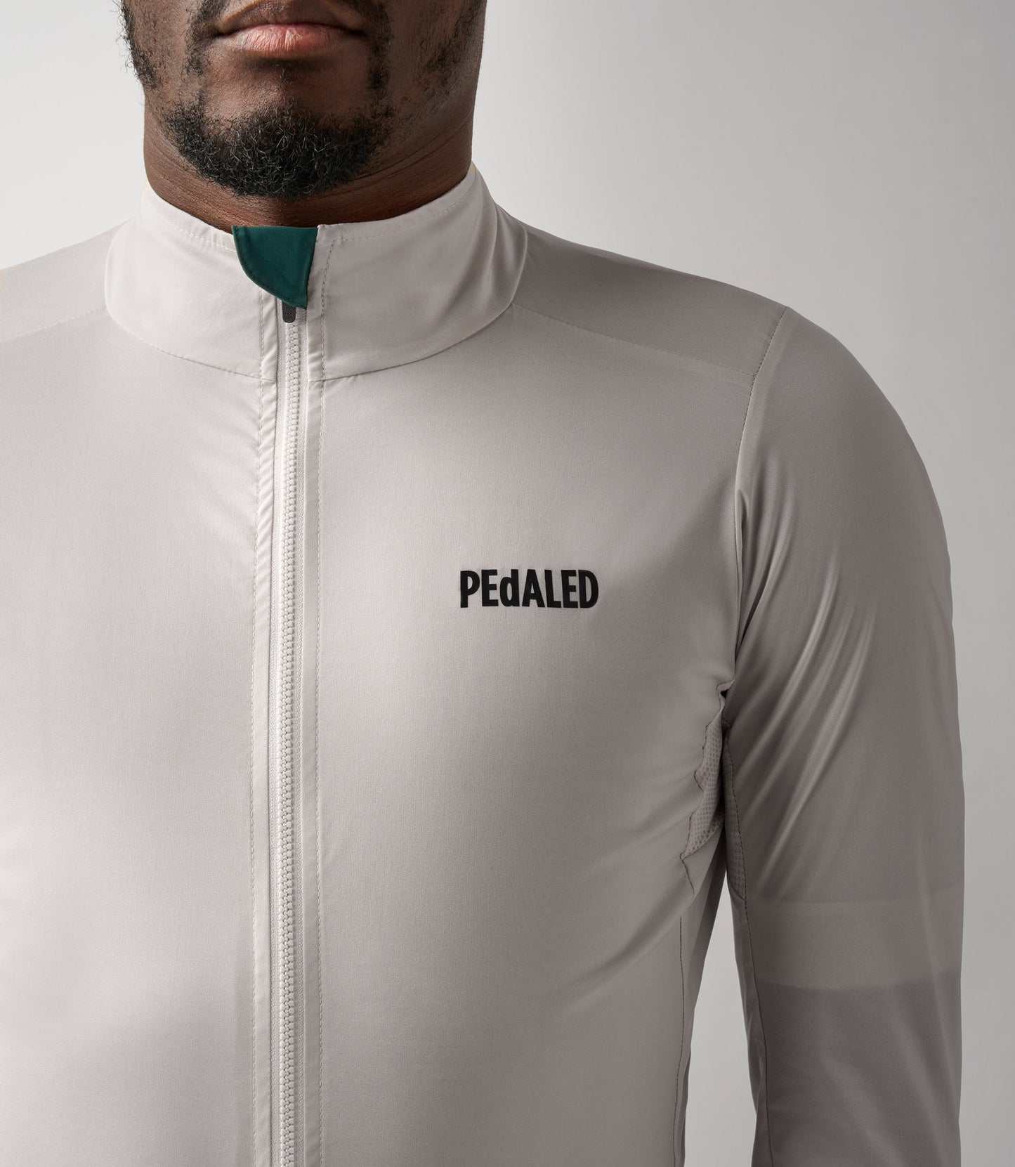 23SJKES0GPE_5_cycling windproof jacket men white essential front pedaled