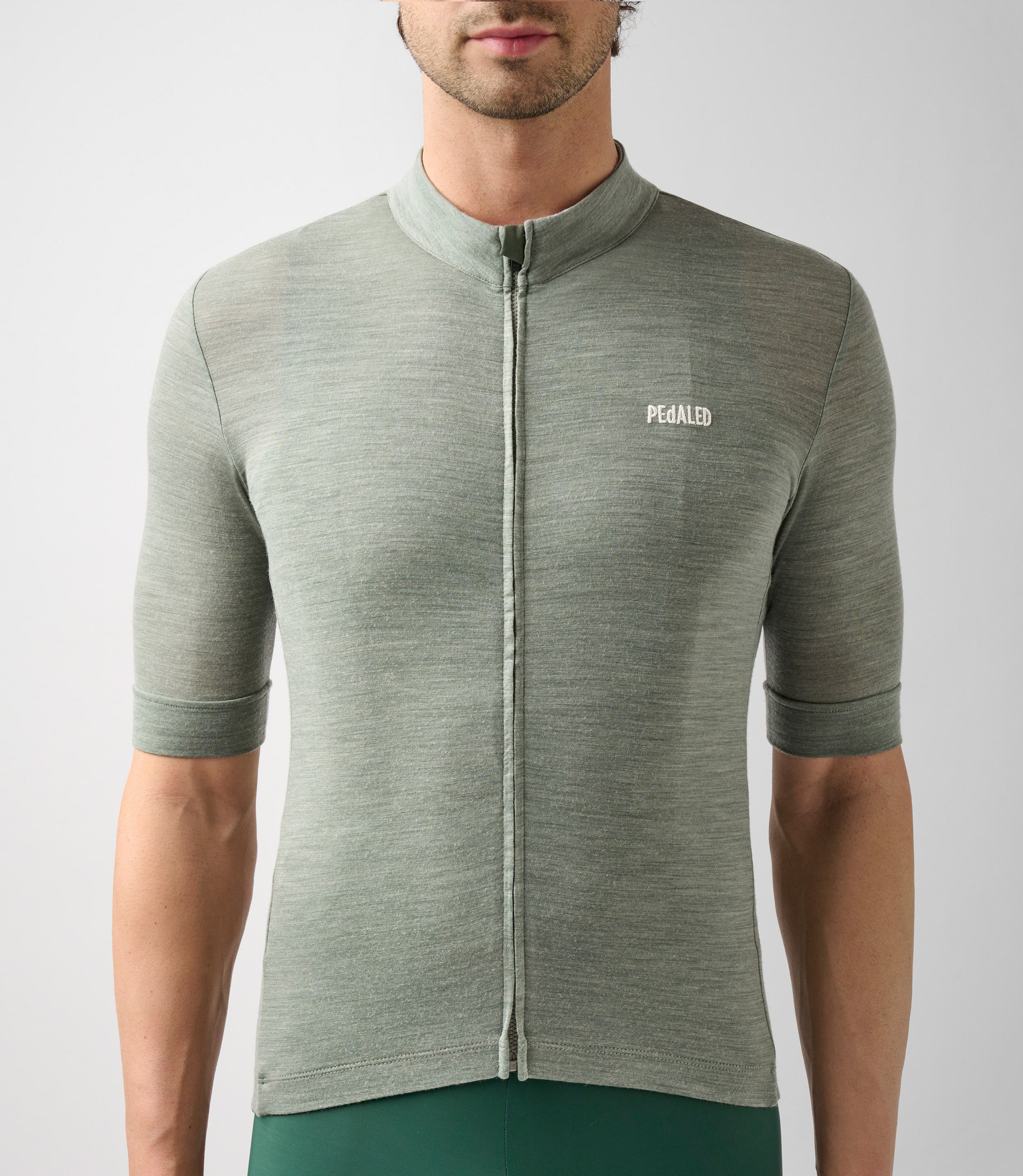23SJSEM03PE_5_cycling merino jersey men green essential front pedaled