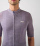 23SJSEM0IPE_8_cycling merino jersey men lilac essential front pedaled
