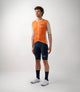 23SJSLO0HPE_3_men cycling jersey logo orange total body front pedaled