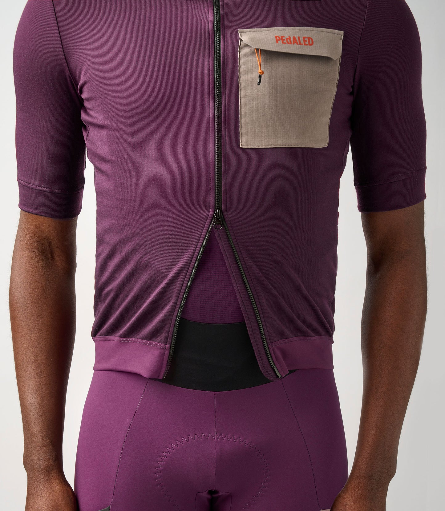 23SMJOD10PE_5_men cycling cargo jersey purple odyssey double zip pedaled