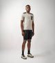 23SMTOD0GPE_4_men cycling merino tee white odyssey total body front pedaled