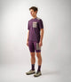 23SMTOD10PE_3_men cycling merino tee purple odyssey total body front pedaled