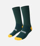 23SSSES78PE_1_cycling socks green essential front pedaled
