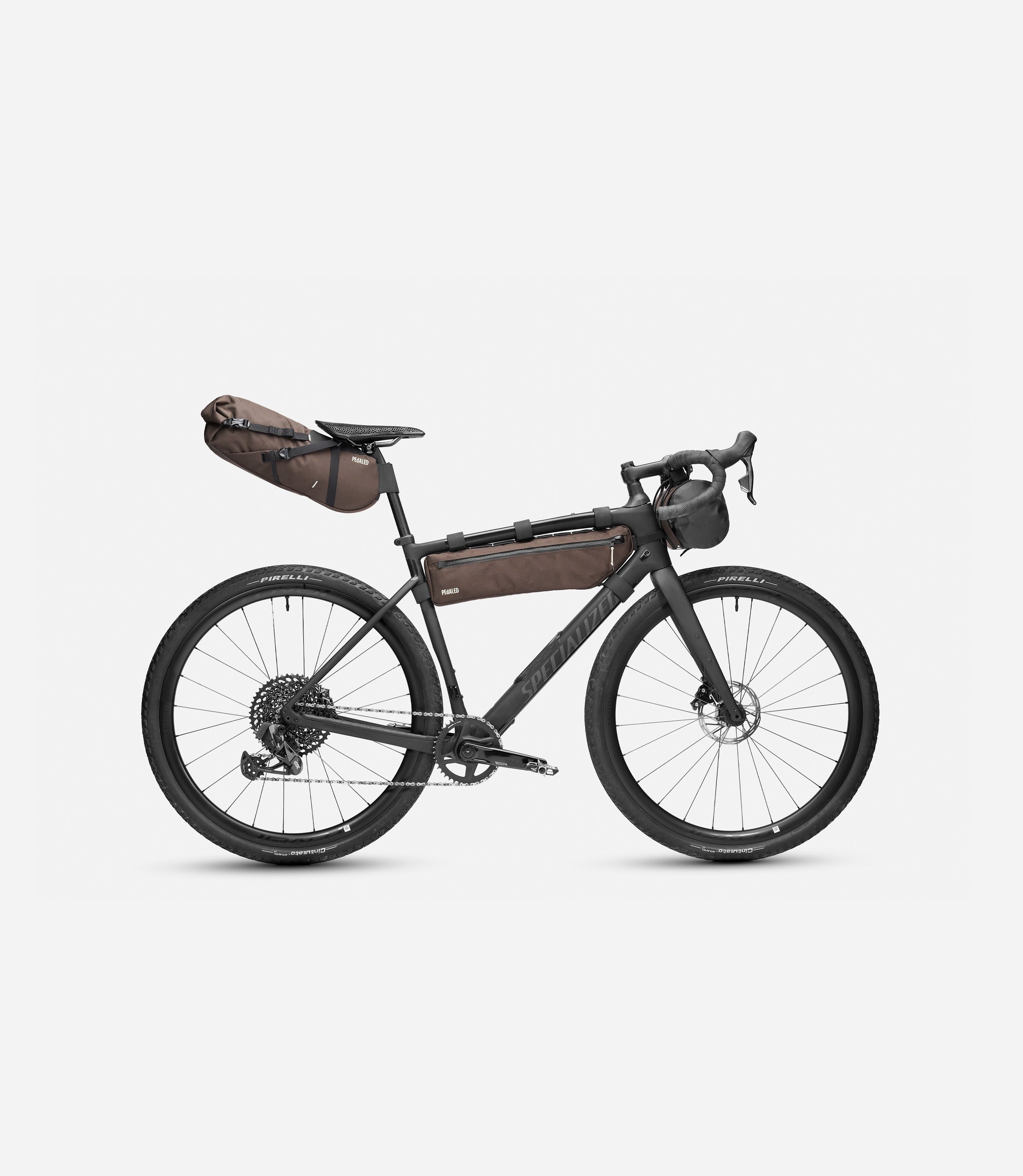 244BBOD14PE_4_bikepacking bag complete kit brown front pedaled 1