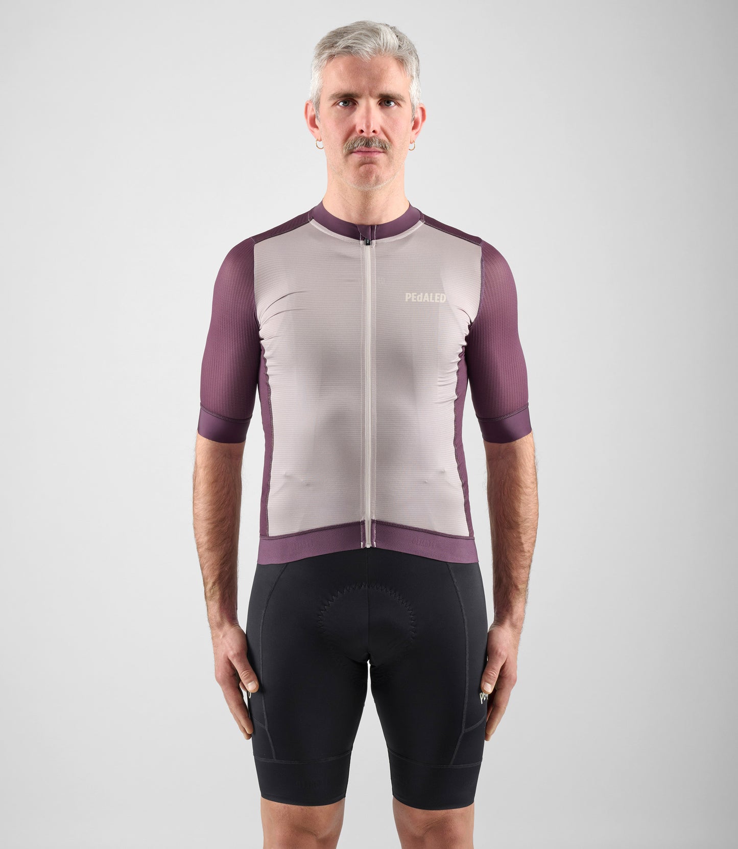 24SJSEL26PE_3_men cycling jersey element burgundy total body front pedaled