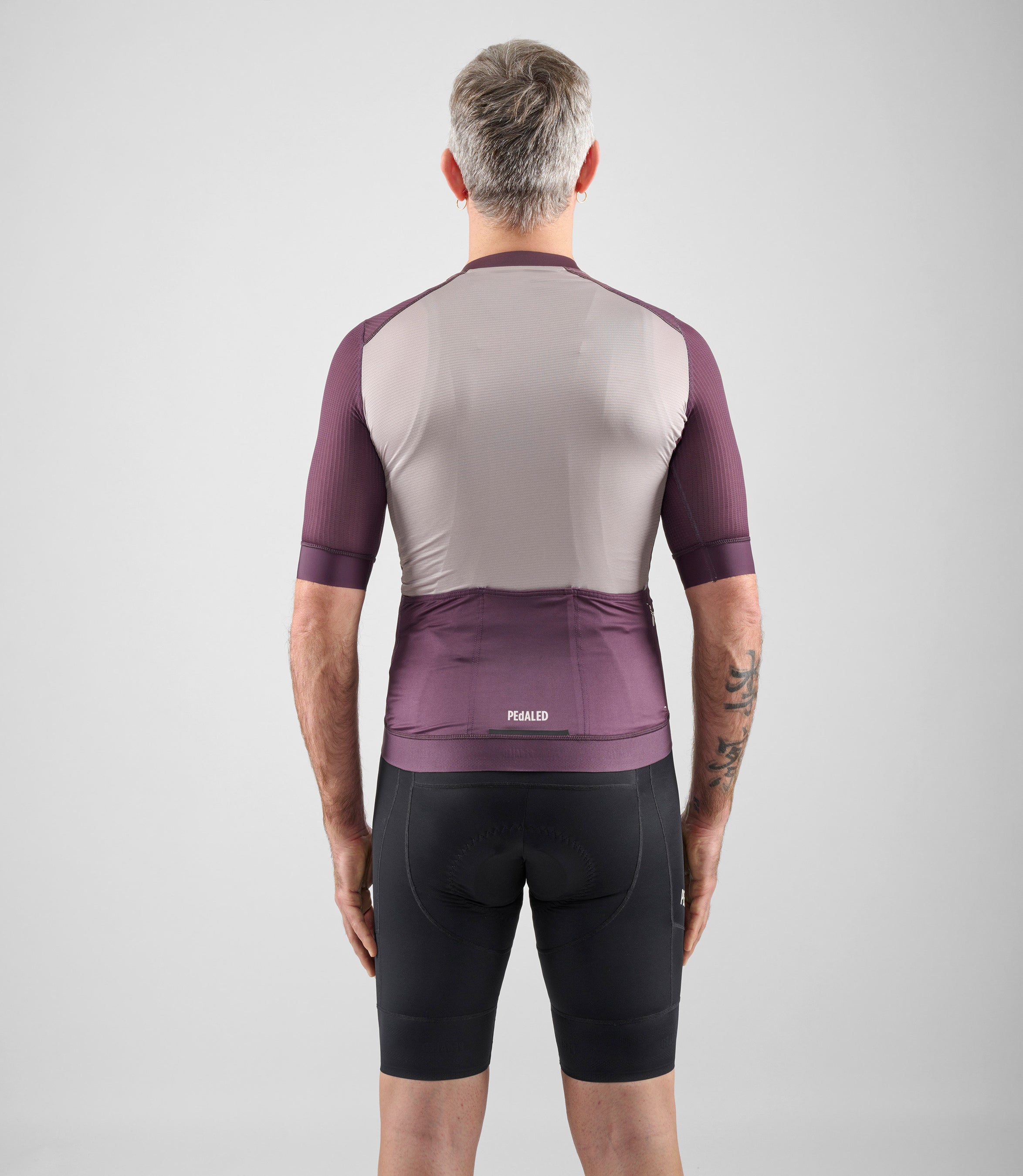 24SJSEL26PE_4_men cycling jersey element burgundy total body back pedaled