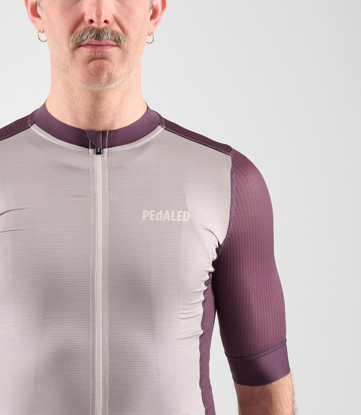 24SJSEL26PE_5_cycling jersey men light burgundy element front left pedaled