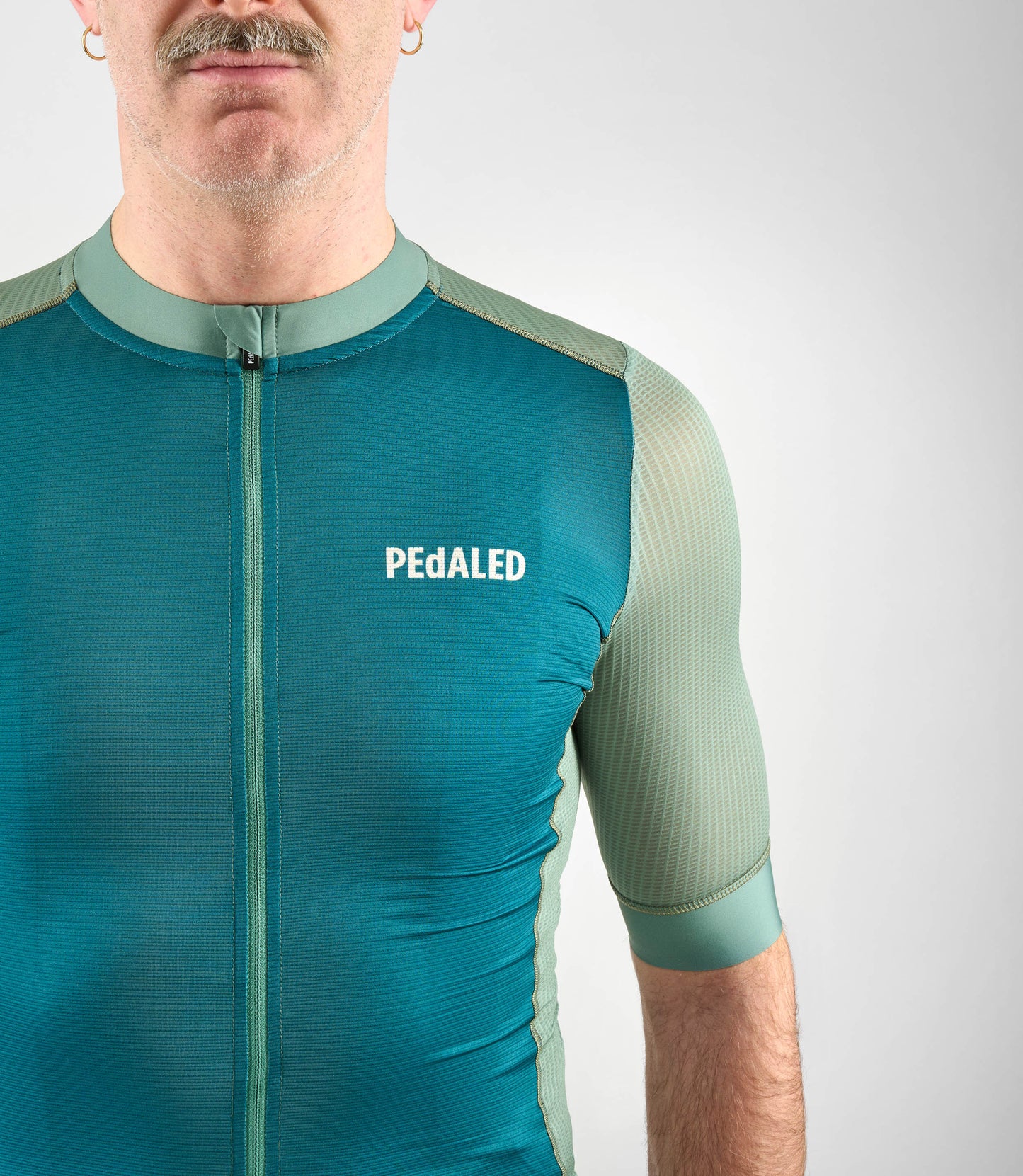 24SJSEL37PE_7_cycling jersey men light green element front pedaled