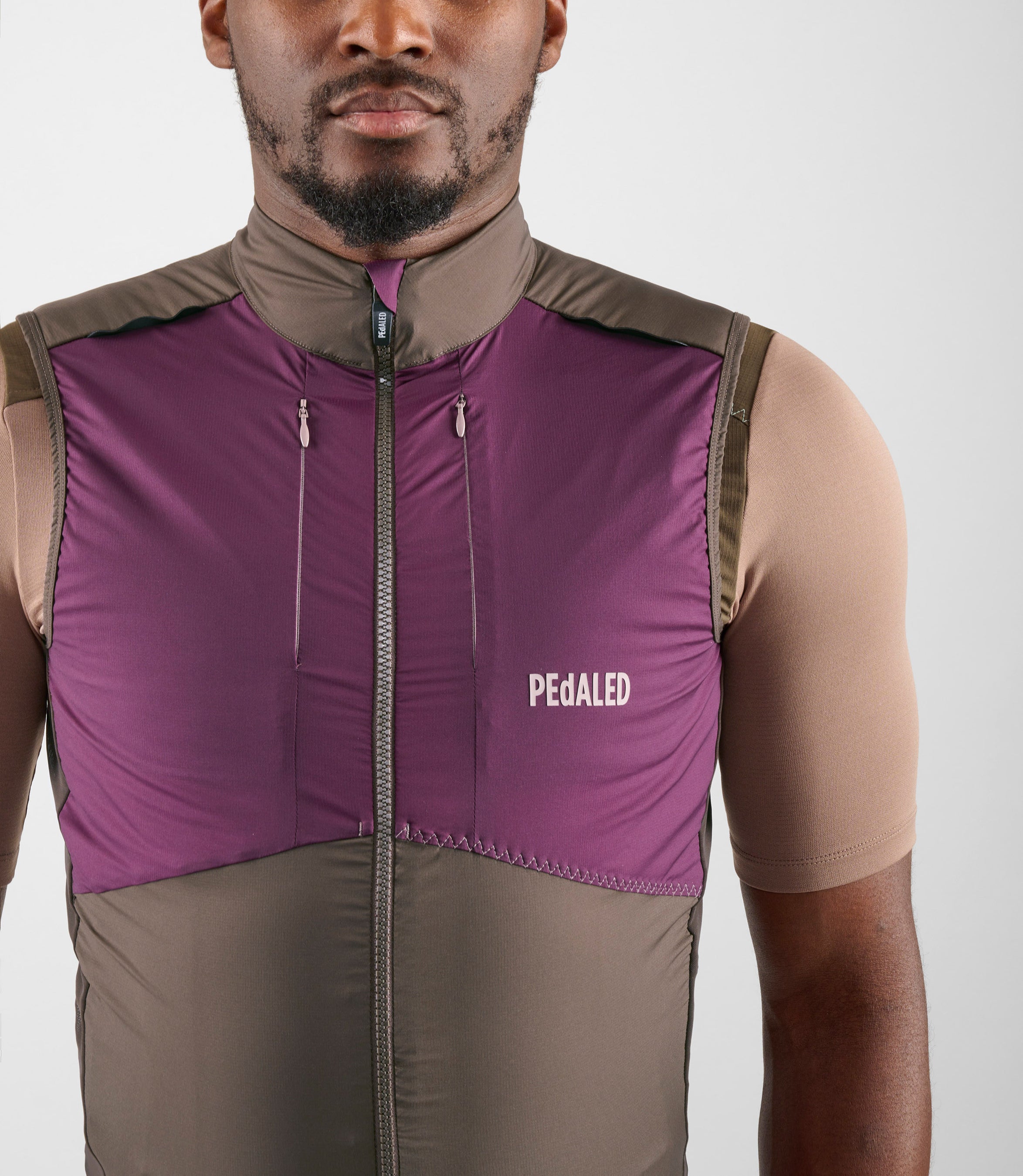 24SVEOD10PE_6_men cycling insulated vest purple odyssey front pedaled