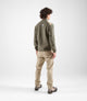 24WCCUR04PE_5_men cycling chino beige urban total body back pedaled