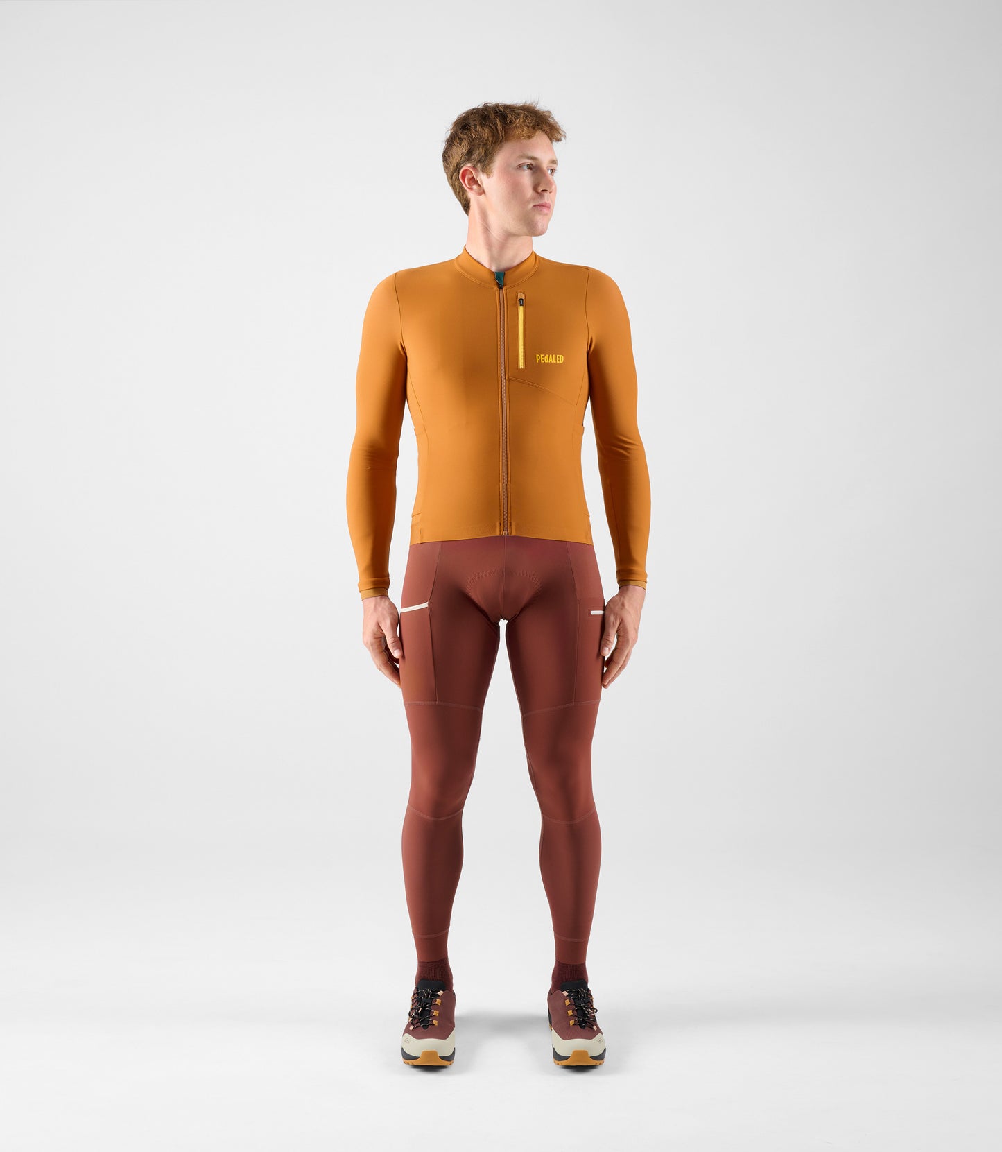 24WJSOD14PE_3_men cycling cargo adventure jersey long sleeve brown odyssey total body front pedaled