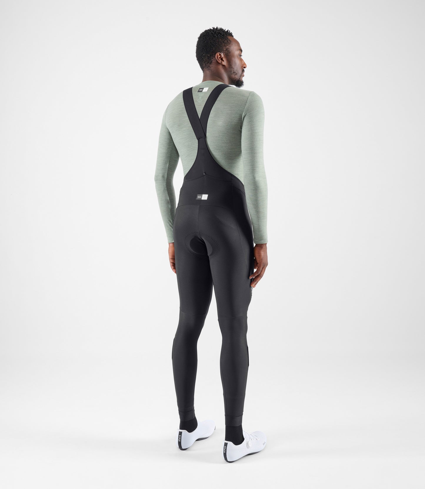 24WMBEL03PE_4_men cycling base layer green element total body back pedaled