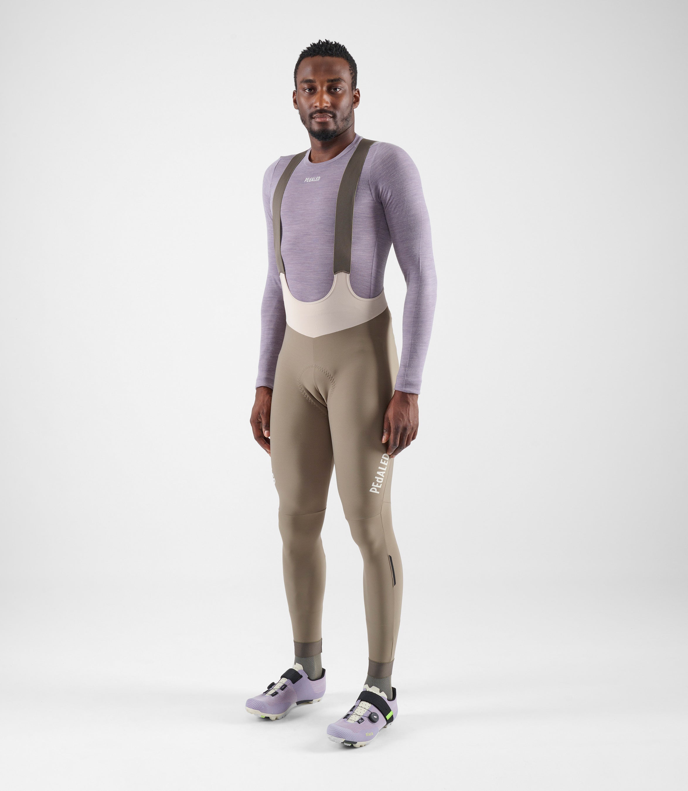 24WMBEL0IPE_3_men cycling base layer lilac element total body front pedaled