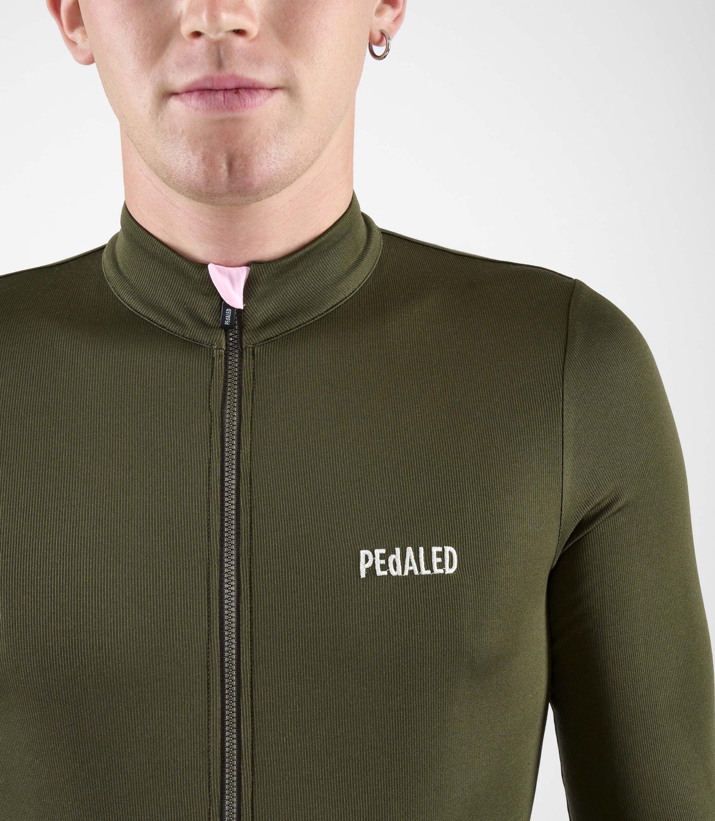 24WMJEL11PE_5_men cycling jersey merino long sleeve green element front pedaled