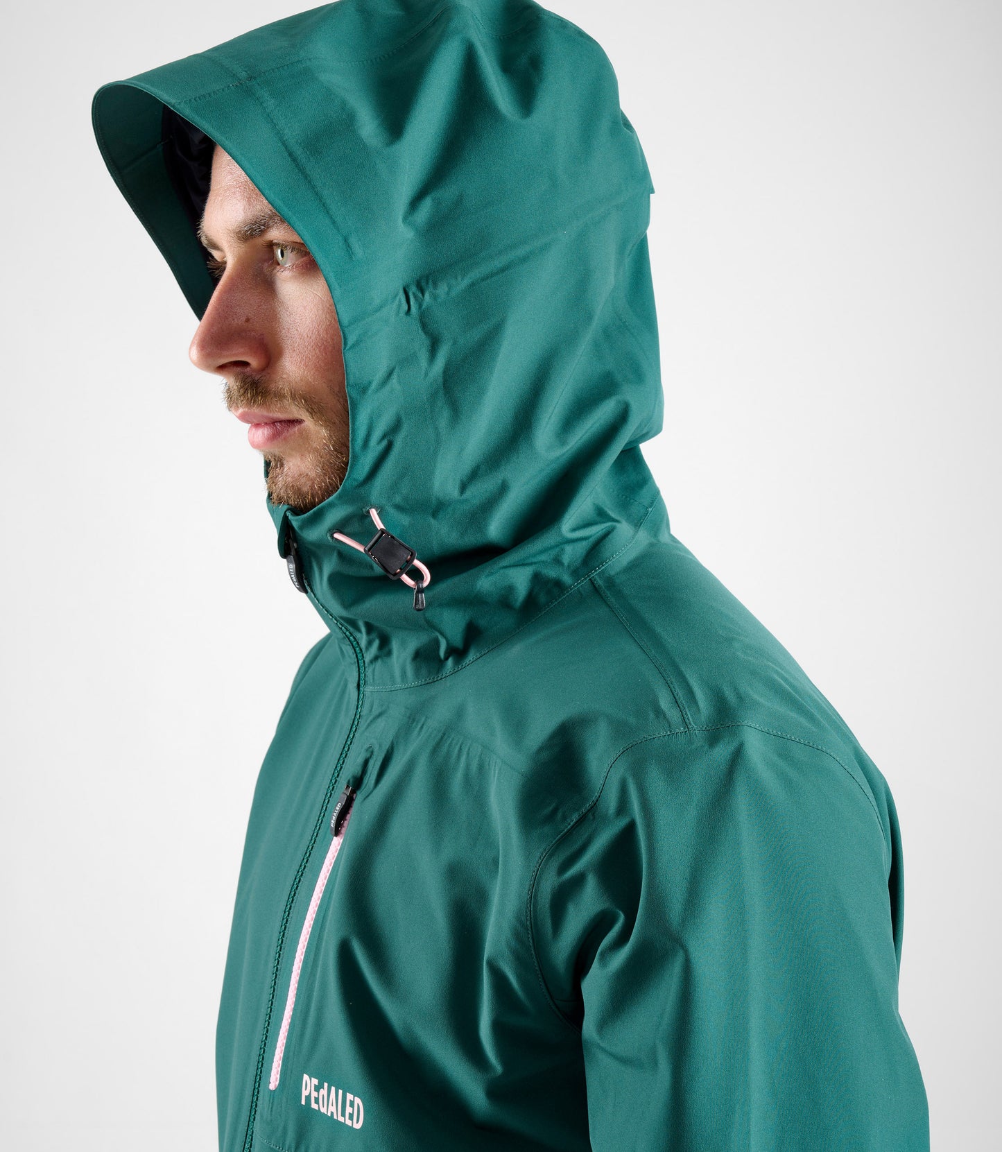 24WSJOD11PE_6_men cycling waterproof shell jacket green odyssey hood side pedaled