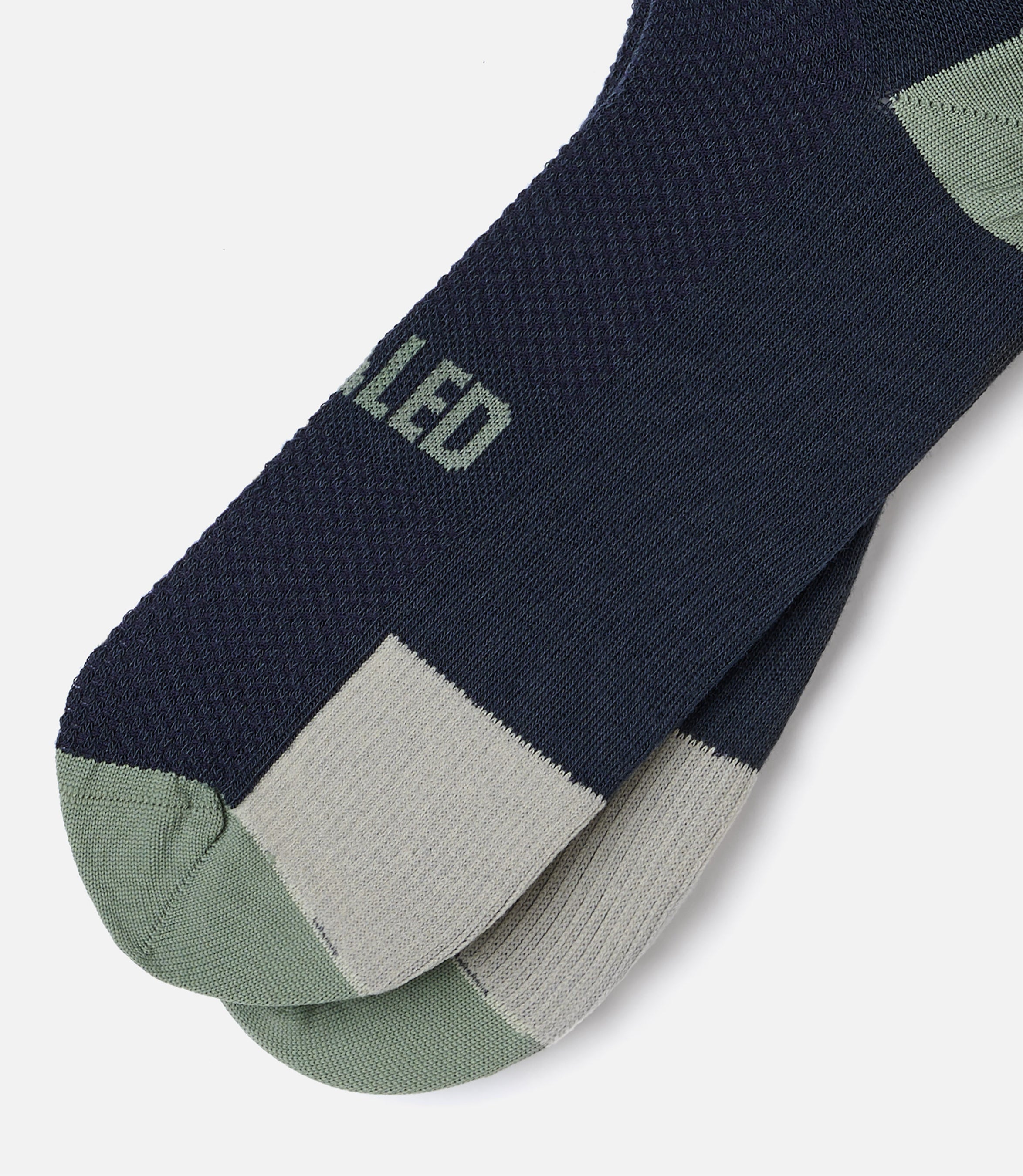 24WSSEL05PE_2_cycling socks navy element detail pedaled