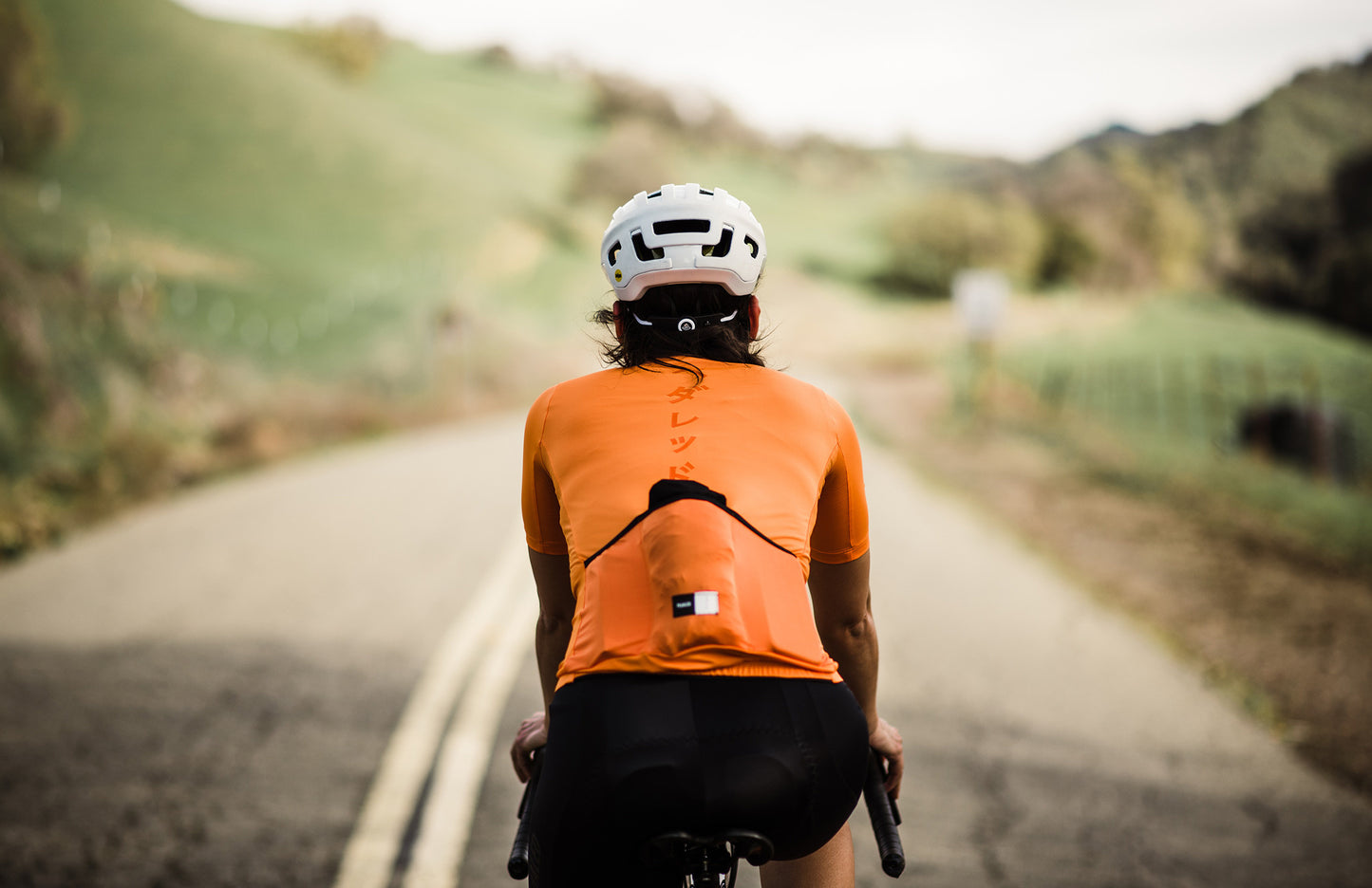 W1SJSMI12PE_5_cycling jersey women orange mirai pedaled