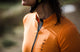 W1SJSMI12PE_6_women cycling jersey front zip orange mirai pedaled