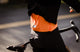 W1SJSMI12PE_7_women jersey cycling back pocket orange mirai pedaled