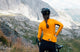 W2WJSMI31PE_3_women long sleeve jersey dark cheddar mirai in action pedaled
