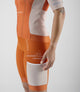 W3SBBTC12PE_7_women cycling bib shorts transcontinental orange left pocket pedaled