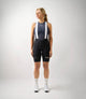 W3SBLEM74PE_3_women cycling merino base layer navy essential total body front pedaled
