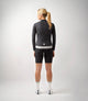 W3SJKES00PE_4_women cycling windproof jacket black essential total body back pedaled