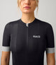 W3SJSES00PE_5_cycling jersey women black essential front pedaled