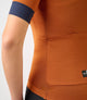 W3SJSES0HPE_6_cycling jersey women orange essential back pedaled