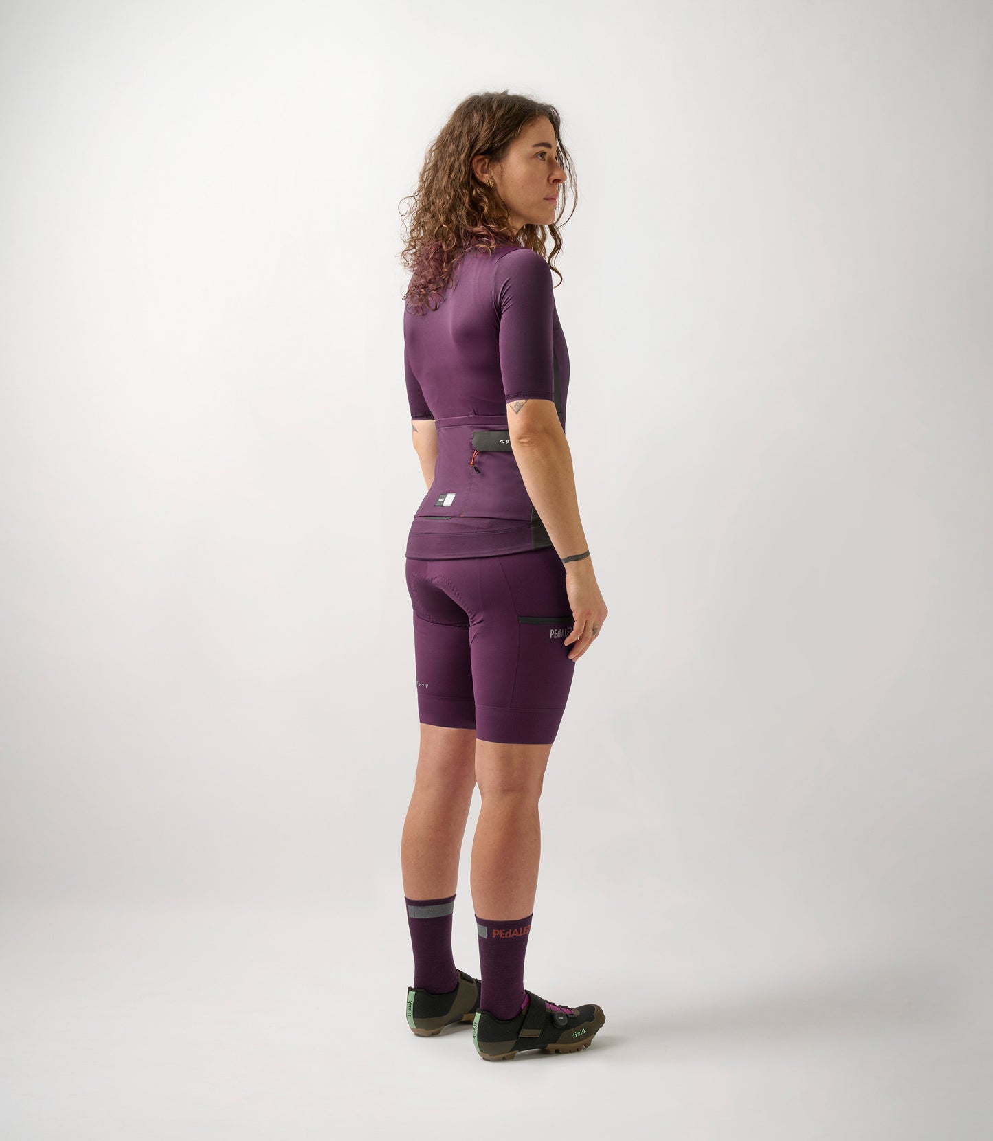 W3SJSOD10PE_4_women cycling cargo jersey purple odyssey total body back pedaled