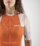 W3SJSTC12PE_7_women cycling jersey transcontinental orange front detail pedaled