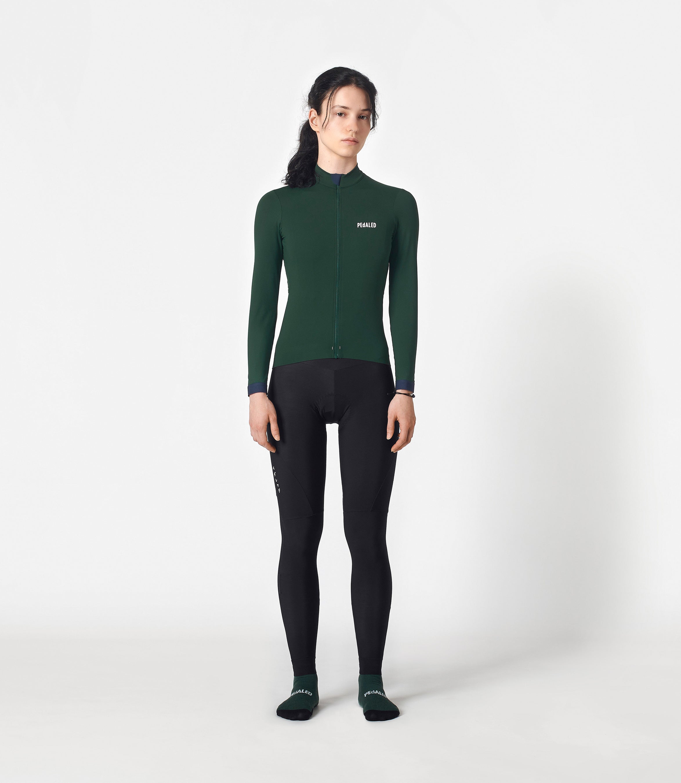 W3WJSEE78PE_3_women cycling jersey long sleeve green essential total body front pedaled