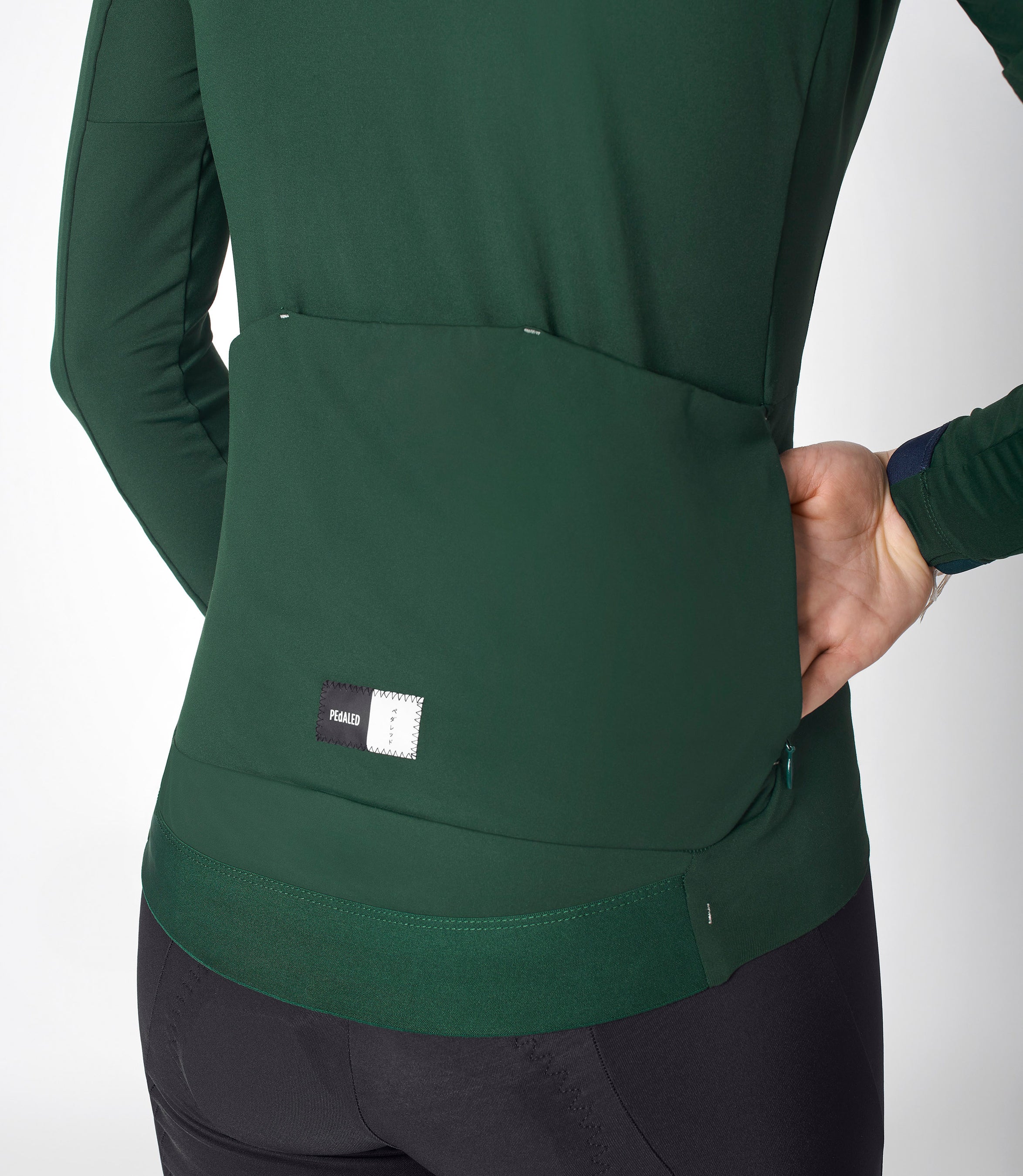 W3WJSEE78PE_8_women cycling jersey long sleeve green essential side pocket pedaled