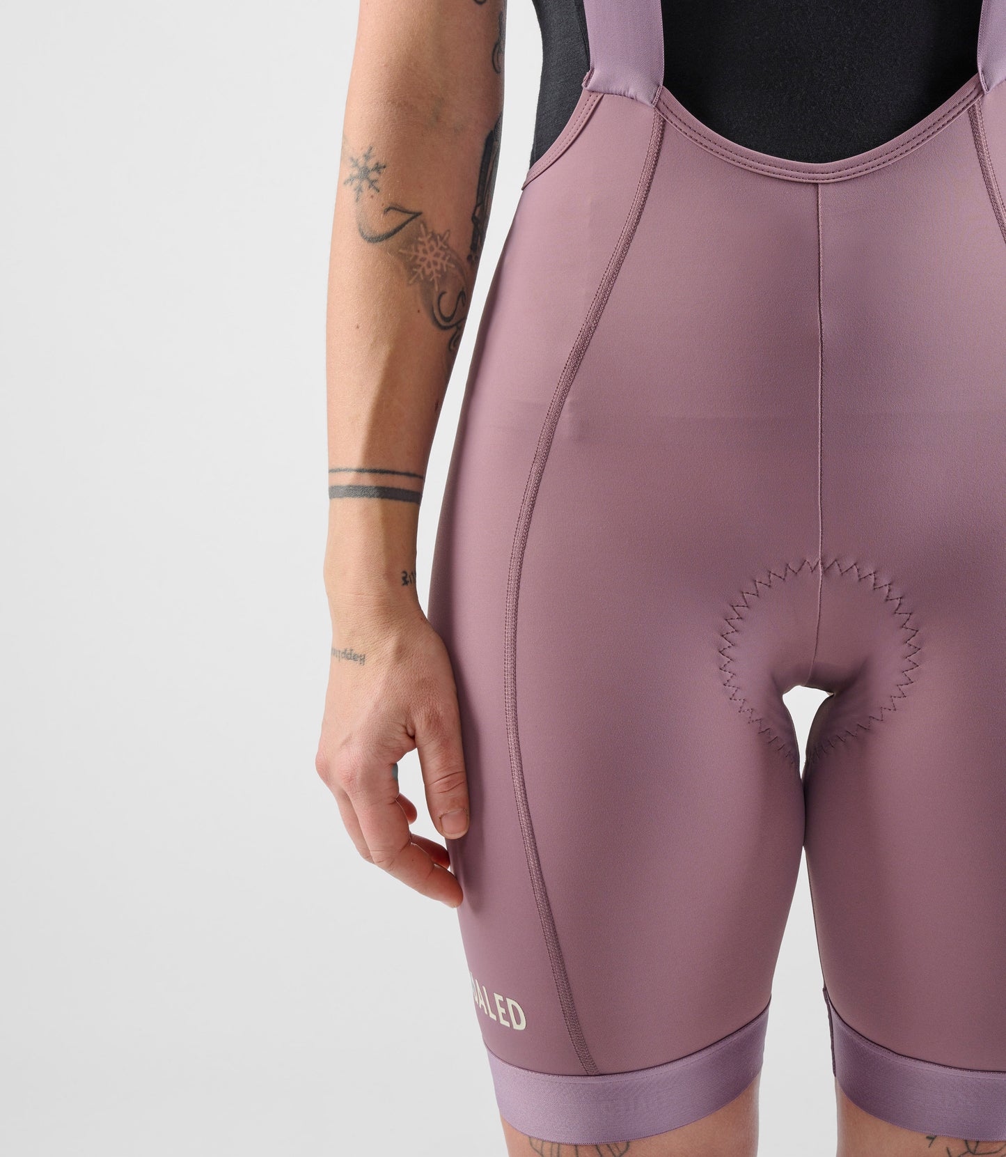 W4SBBEL0IPE_7_women cycling bibshorts element lilac front pedaled
