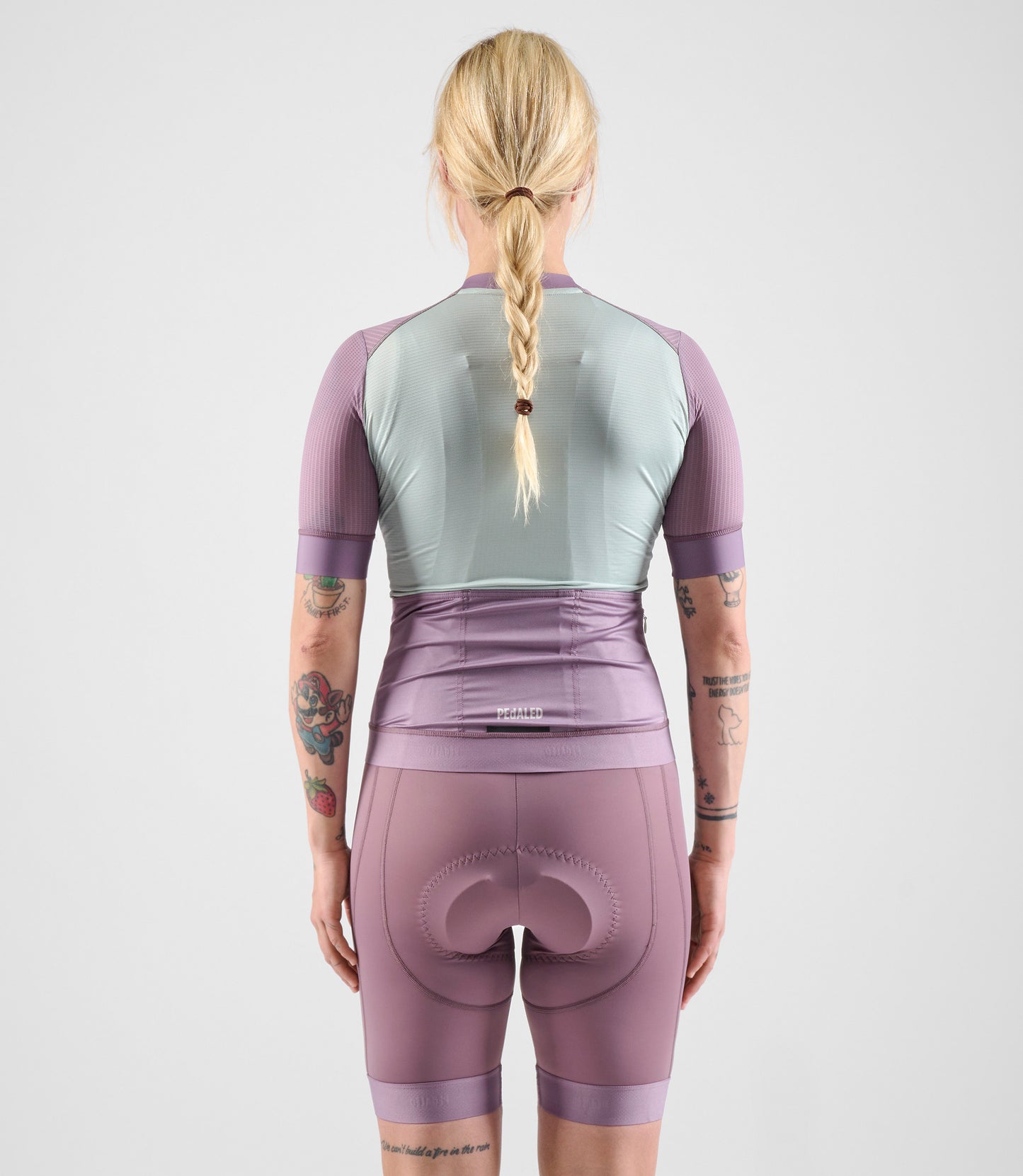 W4SJSEL0IPE_4_women cycling jersey element lilac total body back pedaled
