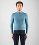 Rider wearing a light blue PEdALED Element Long Sleeve Jersey with dark bib shorts